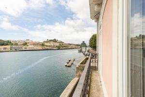 a view of a river from a building at 1872 River House by Olivia in Porto