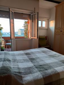 Ένα ή περισσότερα κρεβάτια σε δωμάτιο στο Private room Talika - Apartment shared with the Host