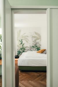 Postelja oz. postelje v sobi nastanitve Consum Boutique Hotel