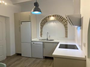 Kuchyň nebo kuchyňský kout v ubytování Precioso apto cerca del Puente del Dragón