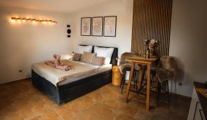 Postel nebo postele na pokoji v ubytování Apartmán Ranč