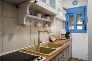 Kuchyň nebo kuchyňský kout v ubytování Hermes Seaview House