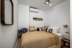 Postel nebo postele na pokoji v ubytování Hermes Seaview House