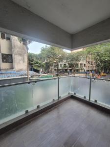 an empty balcony with a view of a city at Elite stays viman nagar in Pune