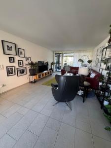 Uma área de estar em Modern and stylish Home in Muttenz