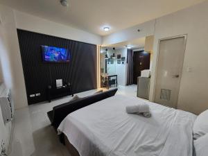 Postel nebo postele na pokoji v ubytování palm tree villas