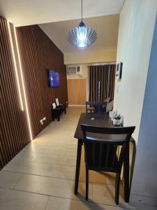 TV a/nebo společenská místnost v ubytování palm tree villas