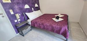 Ліжко або ліжка в номері Hotel Palladion