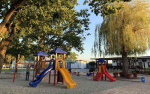 a playground with three slides at Adam Campingplatz in Bühl