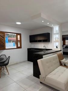 Kuchyň nebo kuchyňský kout v ubytování Casa Beira Mar com Piscina