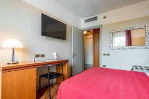 TV a/nebo společenská místnost v ubytování Hotel Della Porta