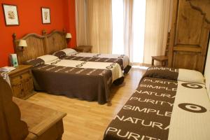 
Een bed of bedden in een kamer bij Hotel La Posada
