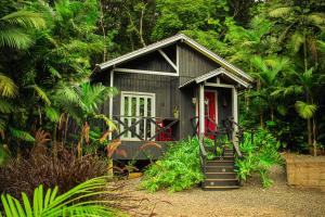 Taman di luar Aconchego dos Pássaros