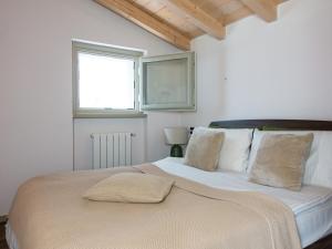 Postel nebo postele na pokoji v ubytování Sogno D'iseo