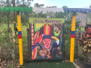 a sign for a forest masaya in a garden at Cabaña jaguar Jacuzzi in Pepino