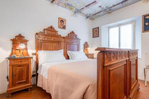 Postel nebo postele na pokoji v ubytování Hotel Della Porta + 34 fotografií