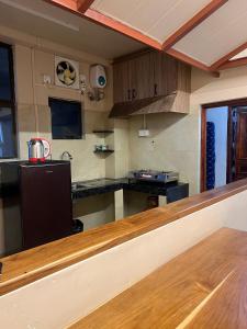 Kuchyň nebo kuchyňský kout v ubytování Zaras Cottage + 8 fotografií