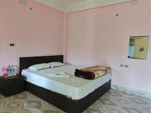 BLISS view RESORT客房内的一张或多张床位