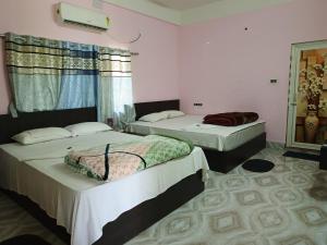BLISS view RESORT客房内的一张或多张床位