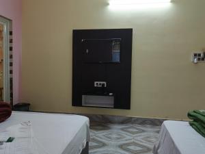 BLISS view RESORT客房内的一张或多张床位