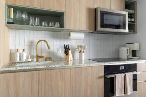 מטבח או מטבחון ב-3209 Apt in Heart of Downtown with Pool a Gym and Spa