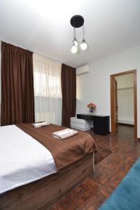 Postel nebo postele na pokoji v ubytování hotel Pushkin + 30 fotografií