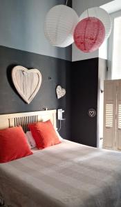 Postel nebo postele na pokoji v ubytování Barrio Boutik Hostal long stays