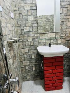 Uma casa de banho em Unic Residence And Transit Hotel