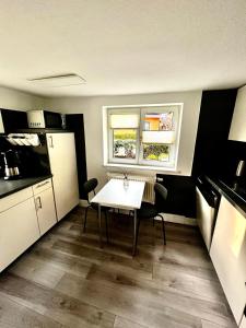 Kuchyň nebo kuchyňský kout v ubytování Michel's Ferienwohnung