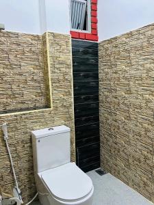 Uma casa de banho em Unic Residence And Transit Hotel