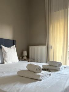 Кровать или кровати в номере Villa Oneiropagida