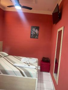 Кровать или кровати в номере Hotel Guarapiranga