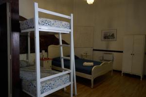 Cama ou camas em um quarto em Hostal Providencia