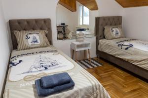 Postel nebo postele na pokoji v ubytování Bubamara house