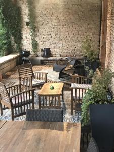 Coin salon dans l'établissement Gîtes L'Art d'une Pause