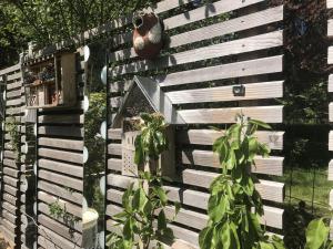 Jardin de l'établissement Gîtes L'Art d'une Pause