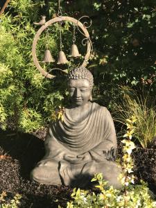 Jardin de l'établissement Gîtes L'Art d'une Pause