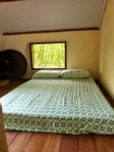 Un ou plusieurs lits dans un hébergement de l'établissement Chalé Trilha SacoBravo