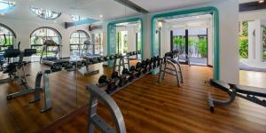a gym with several rows of exercise bikes in a room at Lacasita Luxury 427 Near Huahin Beach in Hua Hin