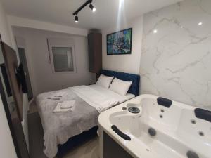 Postel nebo postele na pokoji v ubytování Srebrno srce SPA