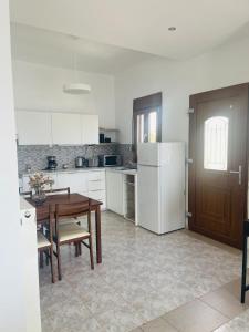 Η κουζίνα ή μικρή κουζίνα στο Beach house