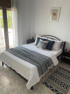 Ένα ή περισσότερα κρεβάτια σε δωμάτιο στο Beach house