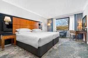 Voodi või voodid majutusasutuse The Galmont Hotel & Spa toas