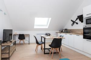 Η κουζίνα ή μικρή κουζίνα στο Le Jardin de Jade