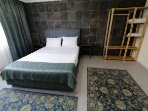 Postel nebo postele na pokoji v ubytování Demre Asya Apart