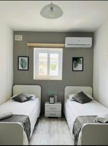 Postel nebo postele na pokoji v ubytování Comfortable room in Malmo- Husievägen 100