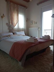 Postel nebo postele na pokoji v ubytování Dora's Home