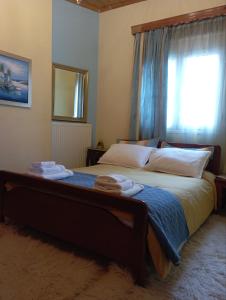 Postel nebo postele na pokoji v ubytování Dora's Home