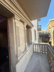 an outside view of a building with a balcony at NINE Hotel Baku 9 in Baku