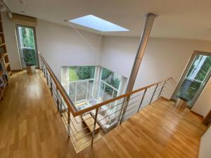 an overhead view of a staircase in a house at Kakumäe Raba Villa - Luxury Private Spa Villa in Tallinn in Tallinn